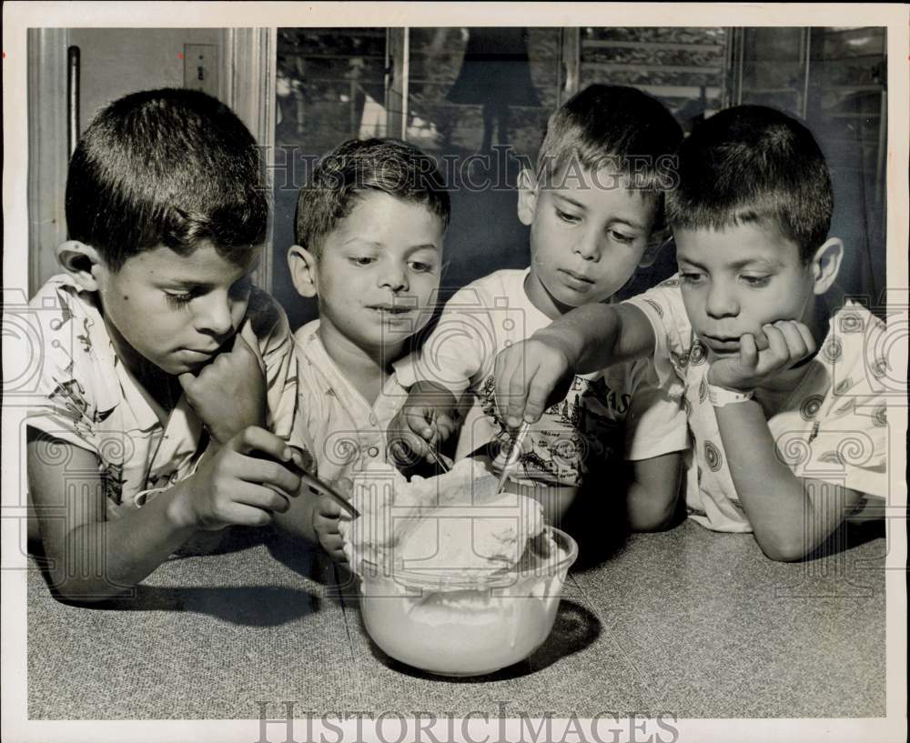 1964 Press Photo Cortez brothers eye big dish of ice cream after tonsillectomy- Historic Images