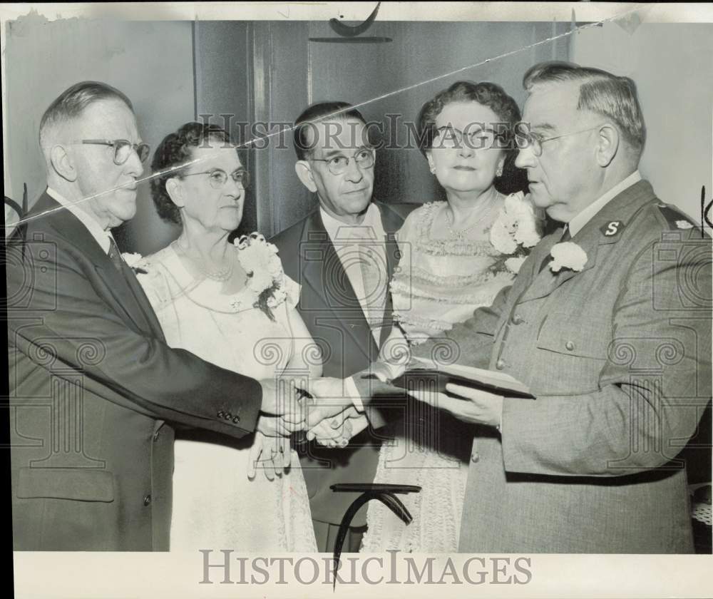 1954 Press Photo Salvation Army members shake hands at the event - lra87258- Historic Images