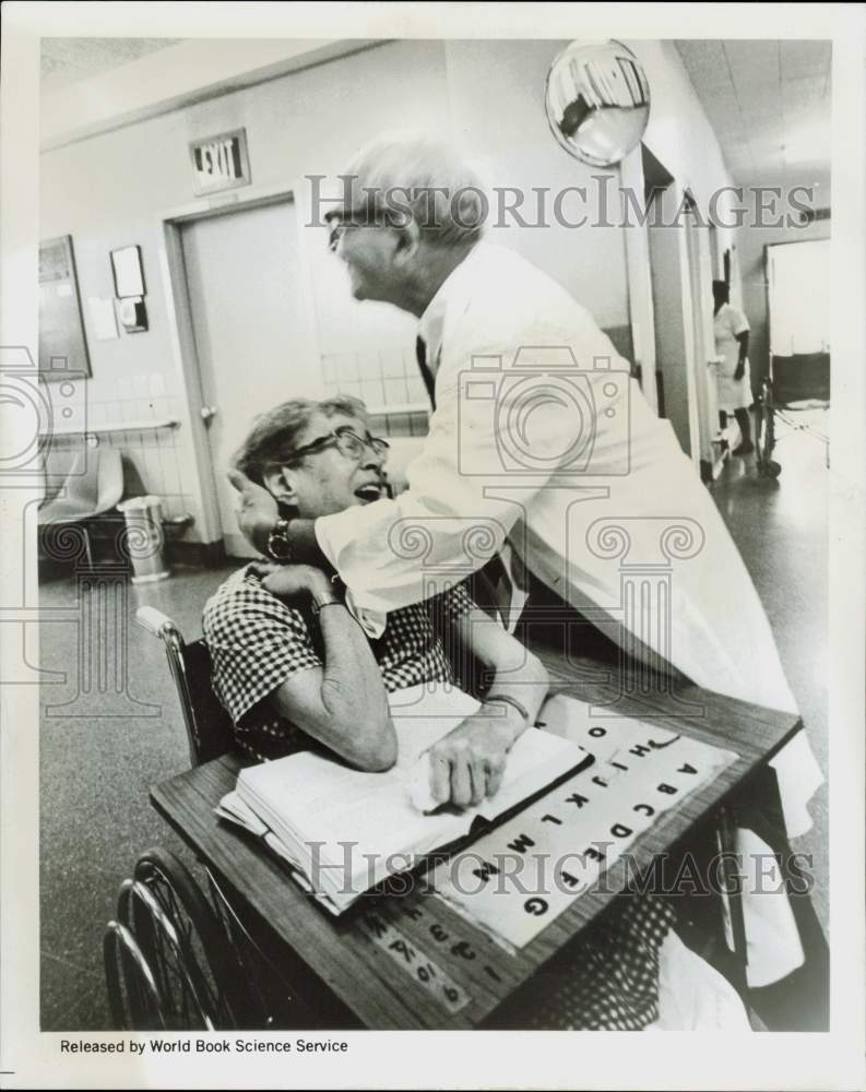 1969 Press Photo Dr. Charles Messeloff hugs patient at New York City hospital- Historic Images