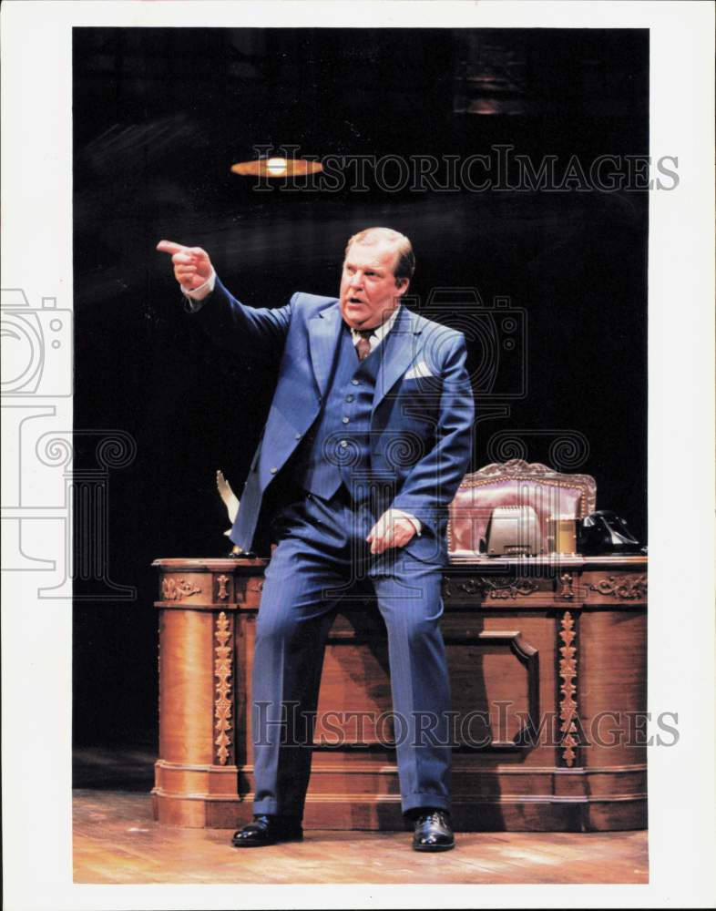 1999 Press Photo Man in suit gives point of view during scene of play- Historic Images