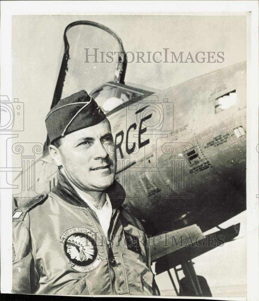 1965 Press Photo Major General Joseph Moore poses beside an F-105 Thunderchief- Historic Images