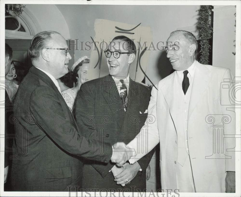 1958 Press Photo William Huffstader, Philip Monahan and Roger Kyes shake hands- Historic Images