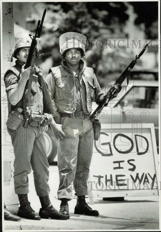 1980 Press Photo Soldiers with Bayonets Beside "God Is the Way" Sign, Miami- Historic Images
