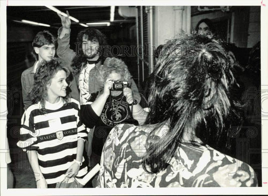 1988 Press Photo Fans snap pictures at Aerosmith's Steve Tyler in Greensboro- Historic Images