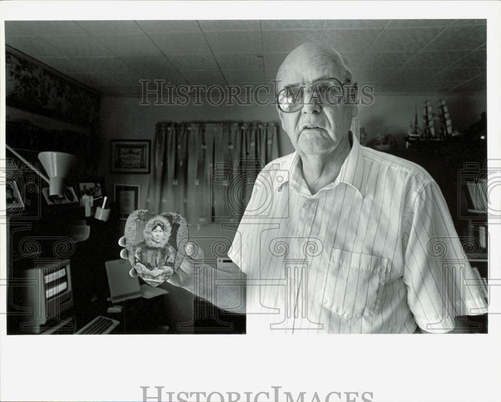 1992 Press Photo John Grainger Holds Antique Postcard in Ketchikan - lrb13026- Historic Images