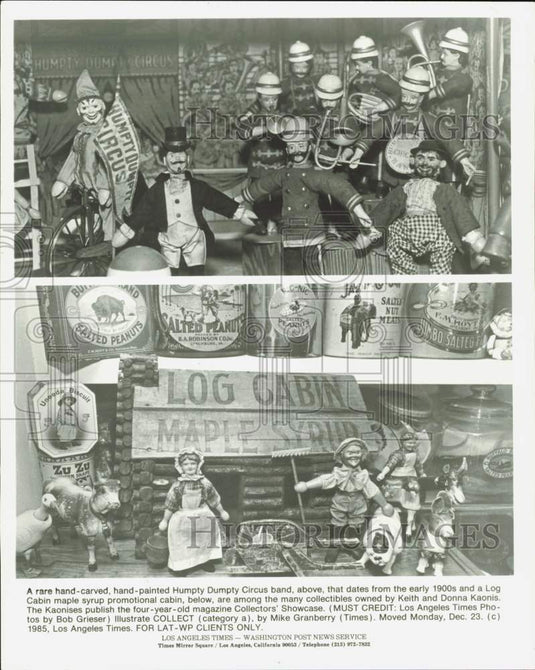 1985 Press Photo Hand-carved Humpty Dumpty Circus band & Log Cabin, circa 1900- Historic Images