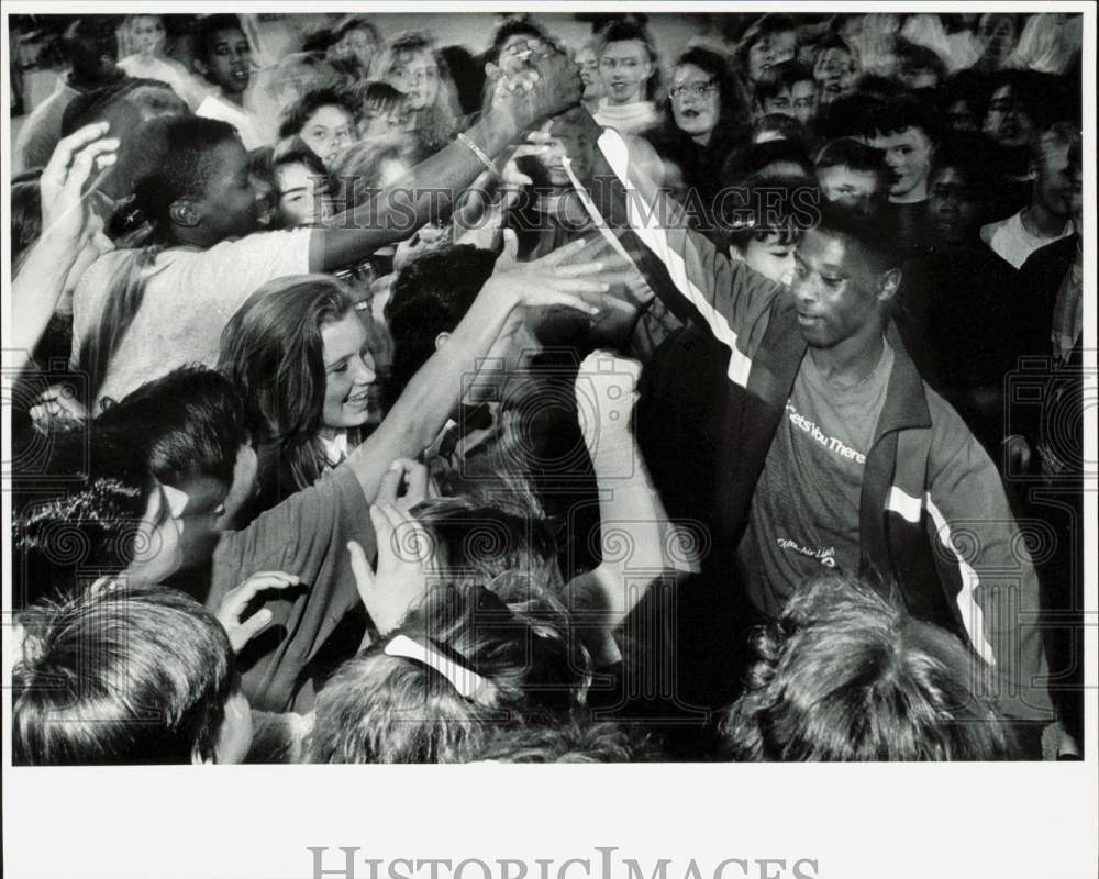 1990 Press Photo Rod Garrett greets classmates after &quot;dance off&quot; at Mears High- Historic Images