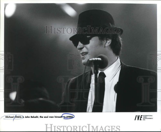 1990 Press Photo Michael Chiklis in a scene from "Wired." - lrp33515- Historic Images