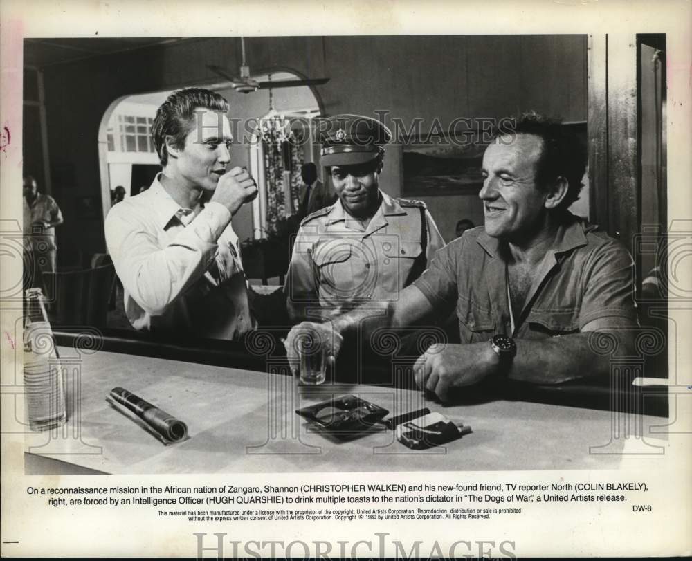 1980 Press Photo The cast in a scene from &quot;The Dogs of War.&quot; - lrp63388- Historic Images