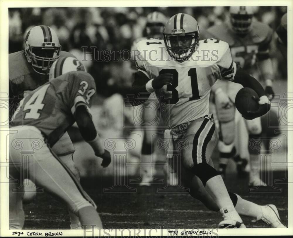 1984 Press Photo Gerry Ellis of Green Bay Packers versus Cedric Brown- Historic Images