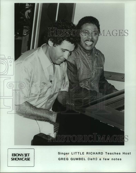Press Photo singer Little Richard teaches host Greg Gumbel a few notes- Historic Images