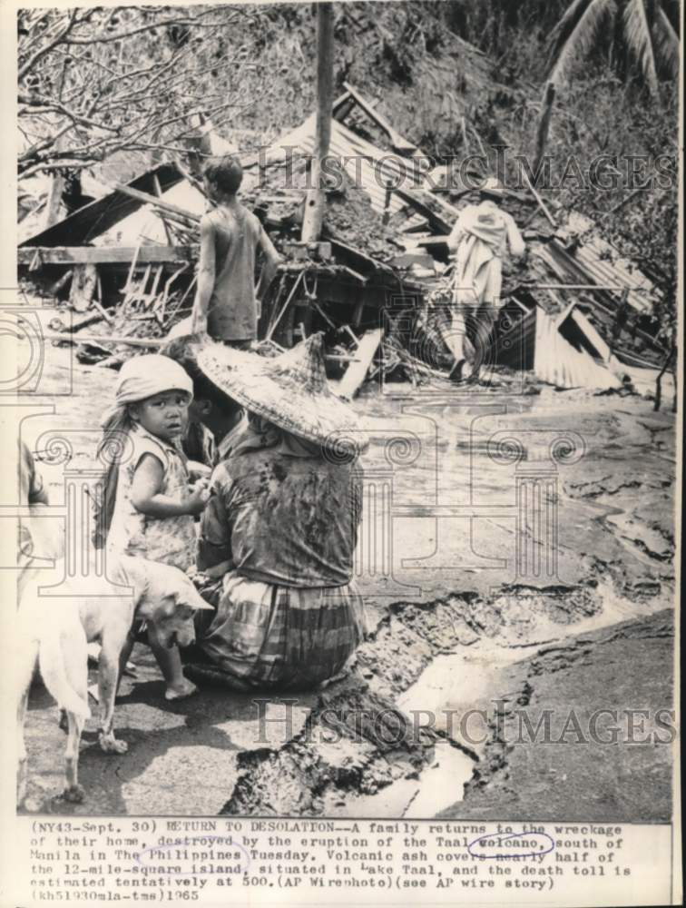 1965 Press Photo Survivors check homes after Taal Volcano eruption-Philippines- Historic Images