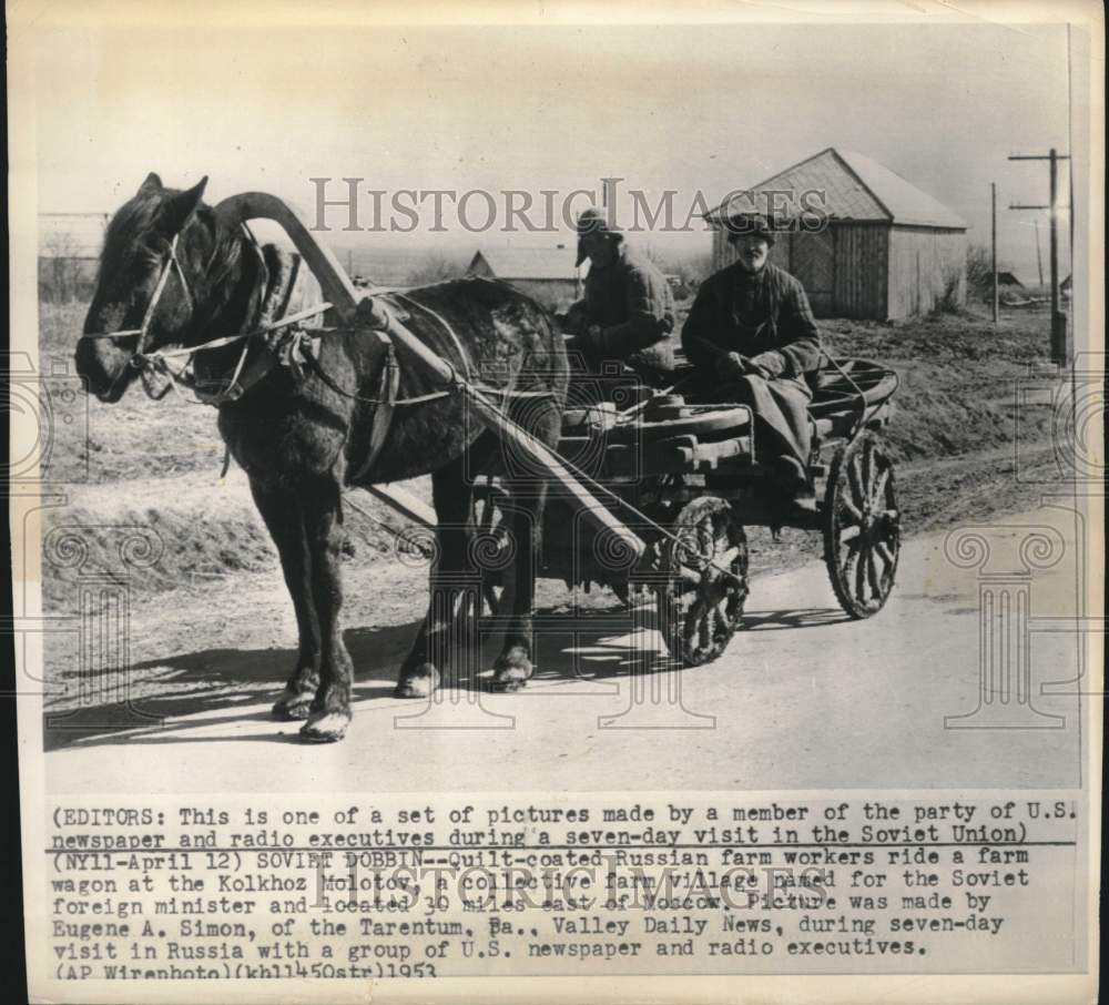 1953 Press Photo Russian farm workers ride in a horse-drawn wagon - lrx75606- Historic Images