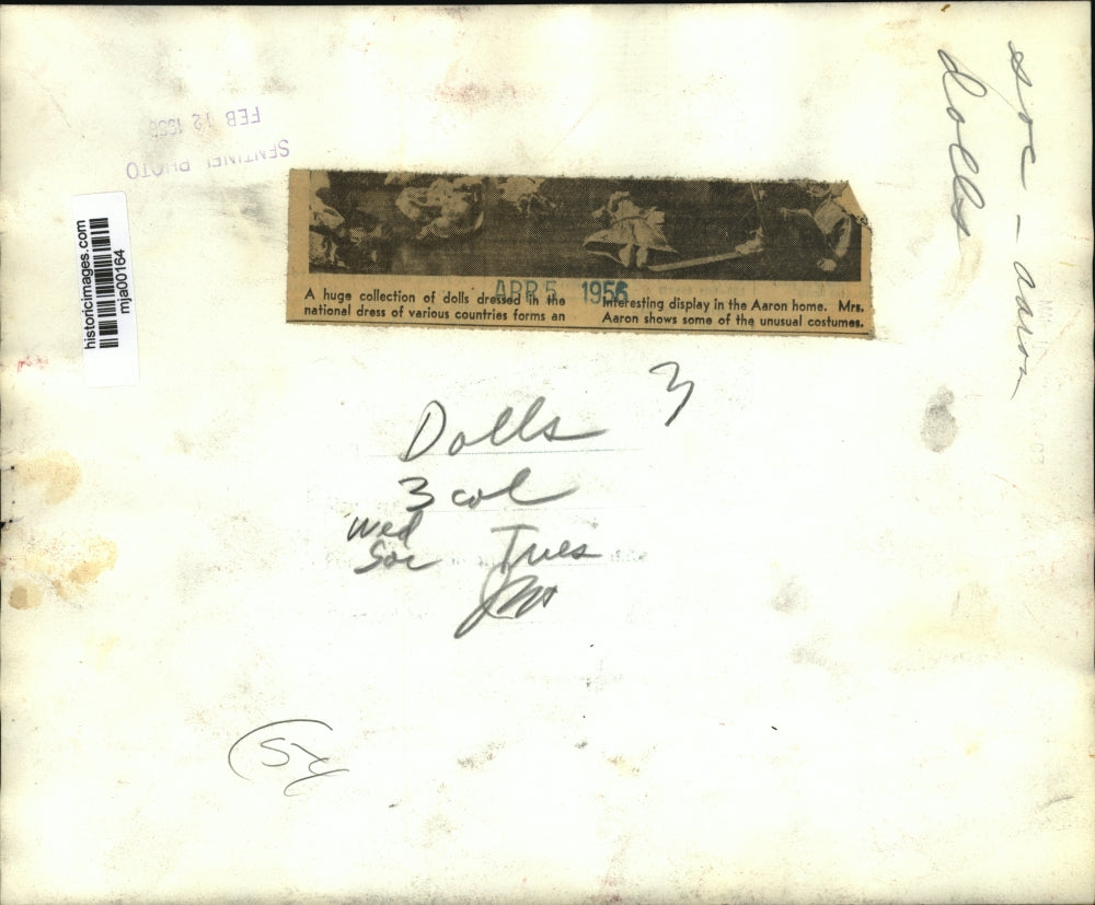 1956 Press Photo Mrs Aaron w/ her collection of dolls dressed in National Dress