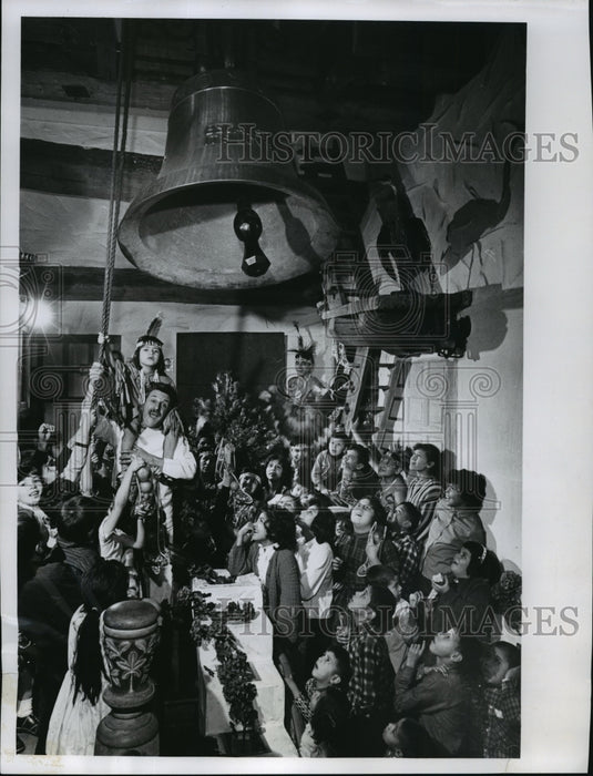 1963 Press Photo Swiss made bell rung by Werner Buchel for Christmas party- Historic Images