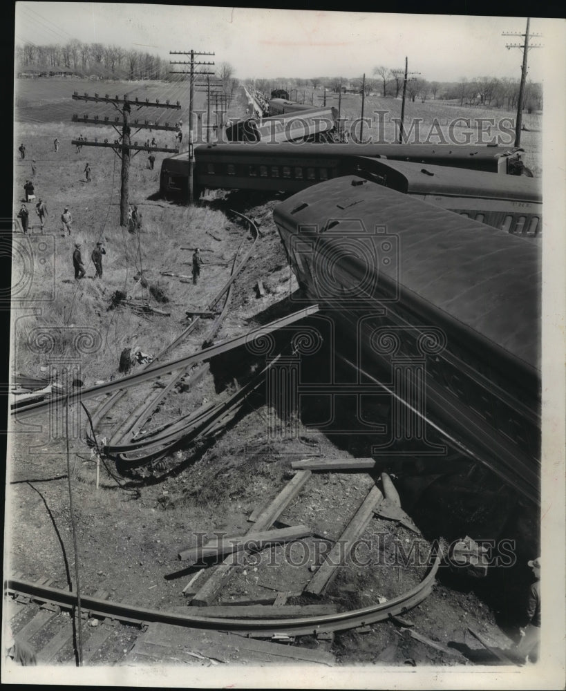 1956 Press Photo Twisted rails and a tangle of coaches littered the tracks