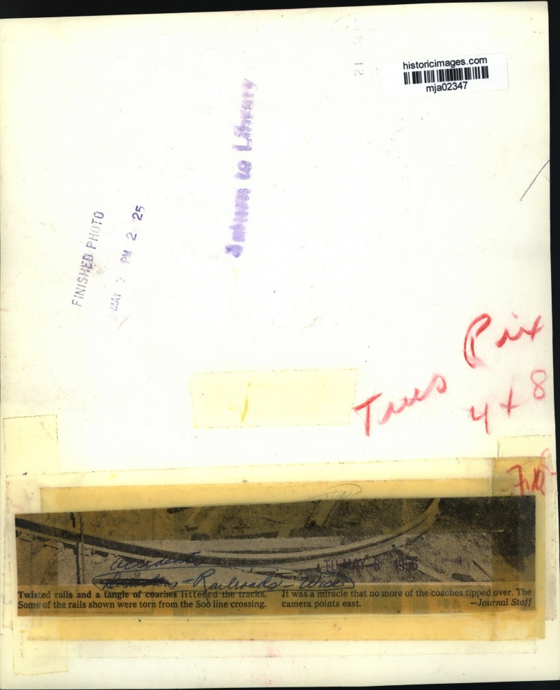 1956 Press Photo Twisted rails and a tangle of coaches littered the tracks