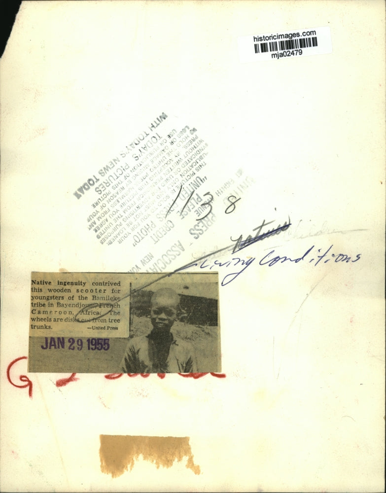 1955 Press Photo Youngsters playing with a scooter made from wood - mja02479