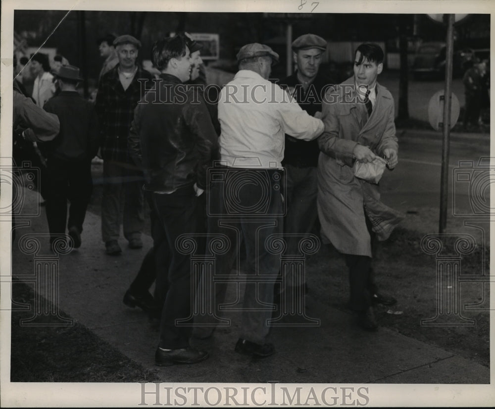 1946 Press Photo Allis-Chalmers Strike-Man being bumped as he enters Hawley Rd.- Historic Images