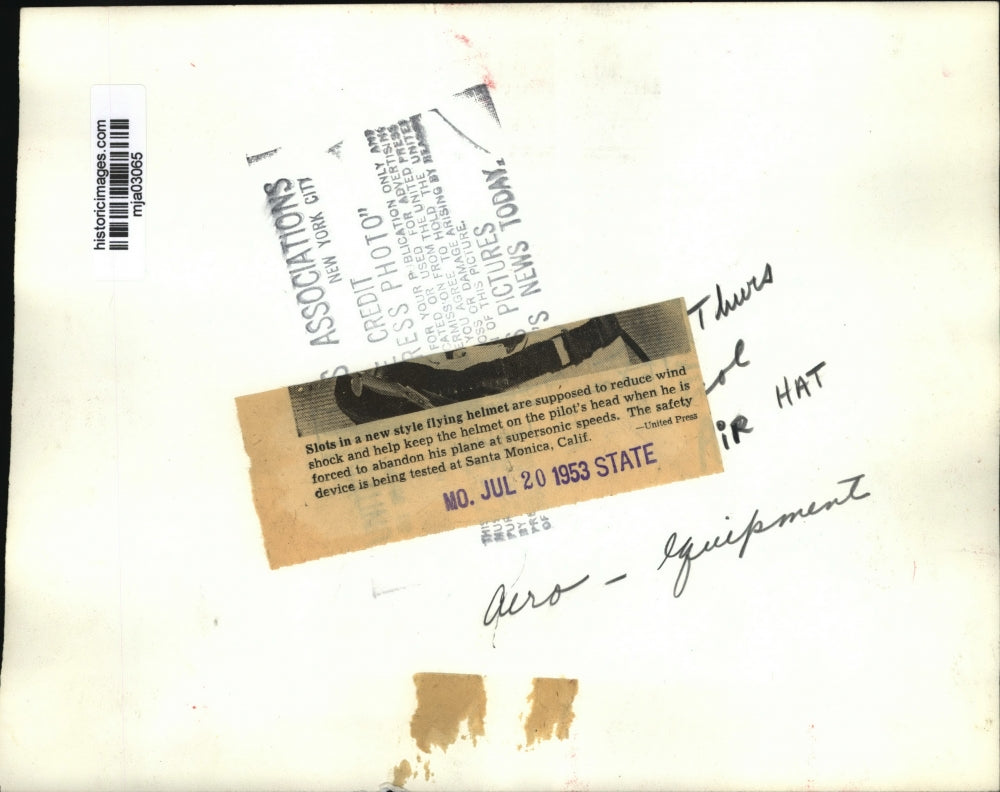 1953 Press Photo Slots in a new style flying helmet are supposed to reduced wind