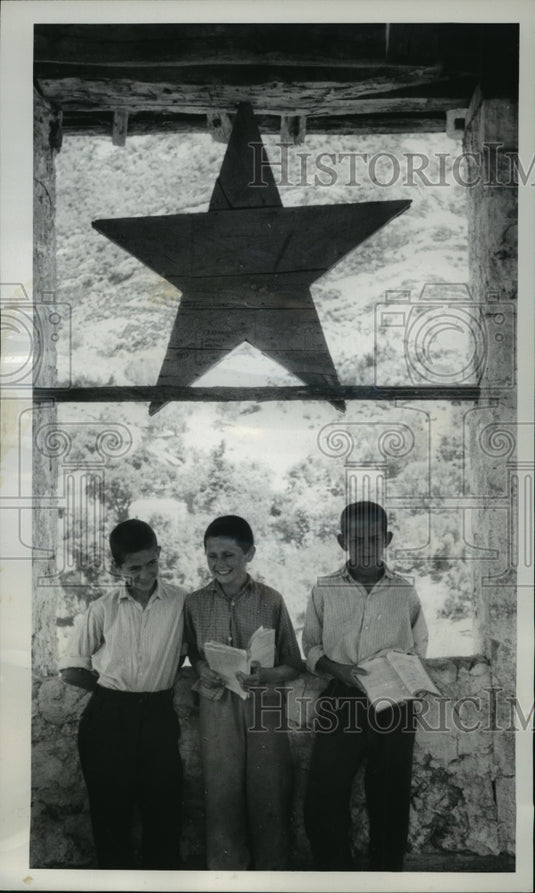 1962 Press Photo Huge wooden Red Star hangs over tower in Tirana, Albania