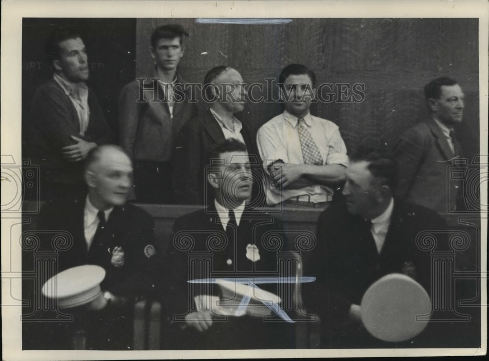 1936 Press Photo Seated in front are policemen waiting to testify in court- Historic Images