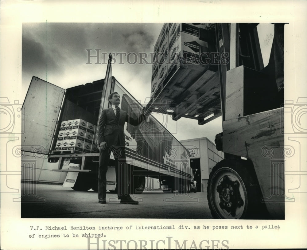 1986 Press Photo Michael D. Hamilton inspects products for export- Historic Images