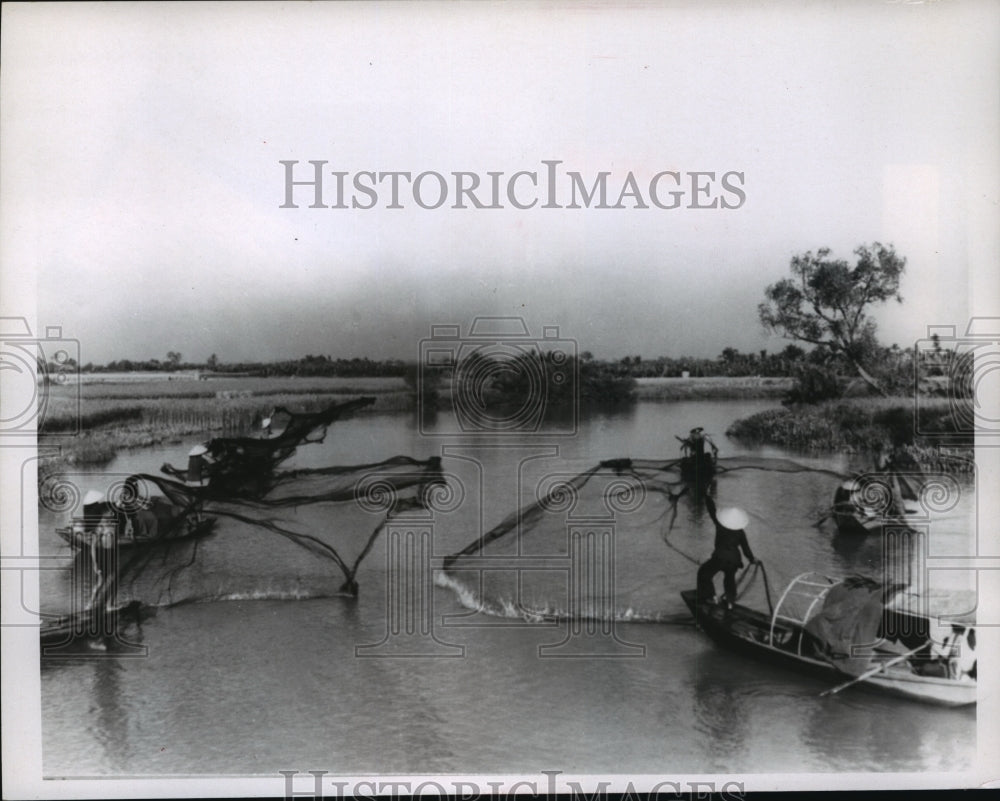 1967 Press Photo Fishermen cast their gill nets on the quiet water of a canal- Historic Images