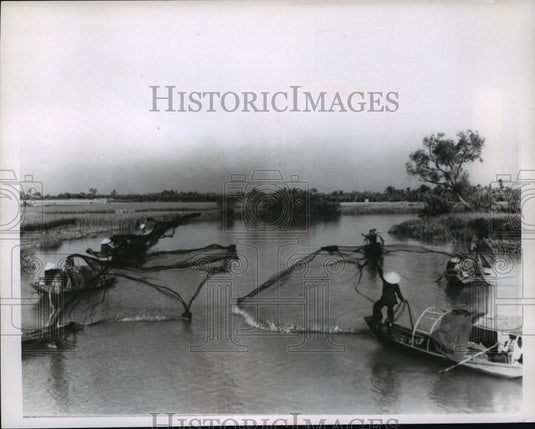 1967 Press Photo Fishermen cast their gill nets on the quiet water of a canal- Historic Images