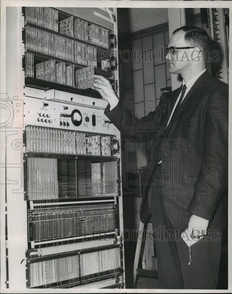 Load image into Gallery viewer, 1965 Press Photo George Braun, quality assurance engineer of Stromberg-Carlson
