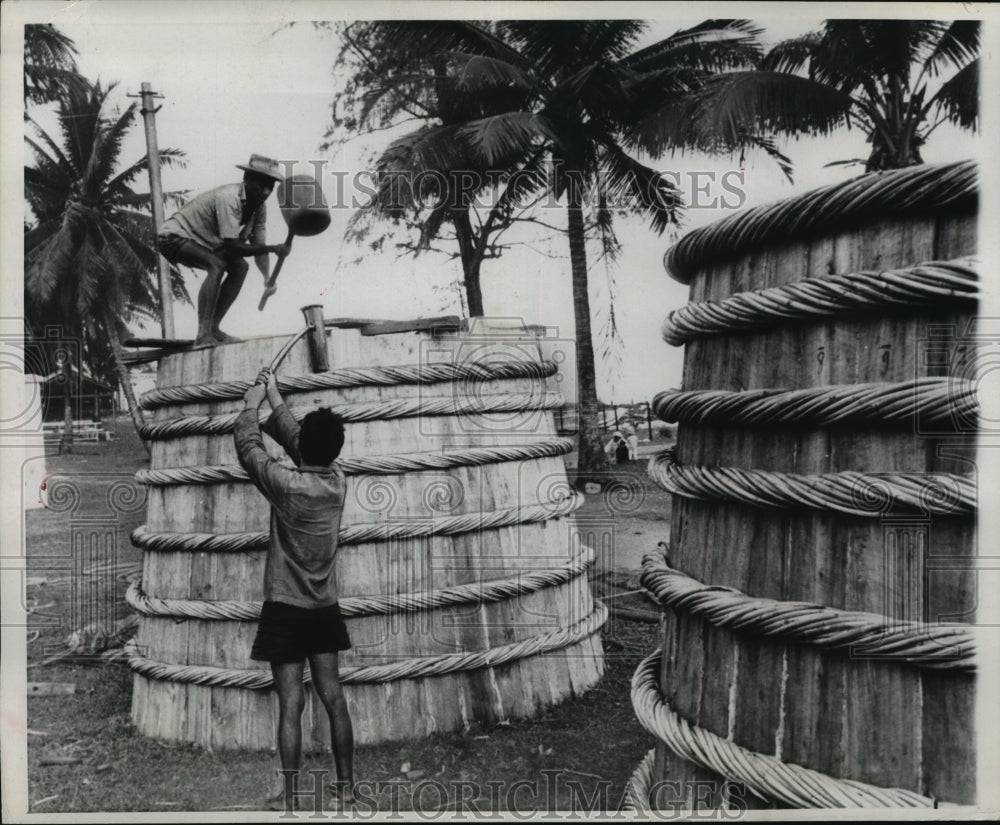 1969 Press Photo Giant nuoc mam vats which hold about 1,750 gallons of flavoring- Historic Images