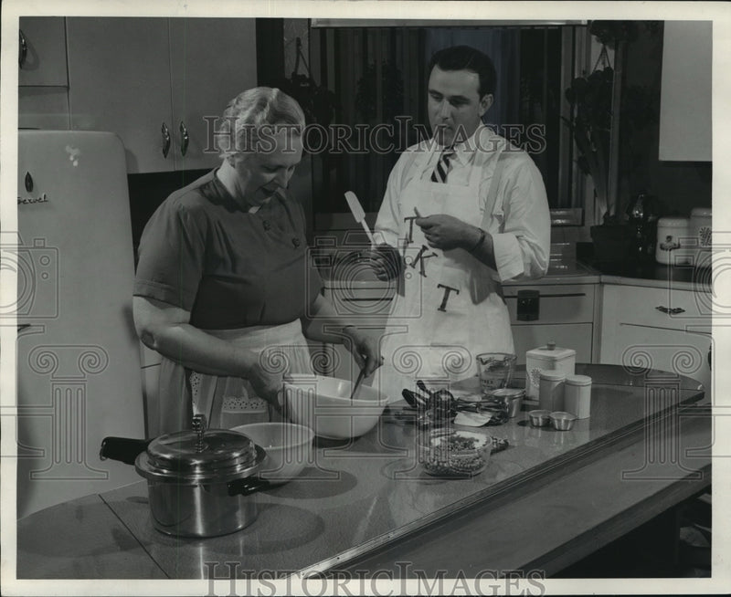 Load image into Gallery viewer, 1951 Press Photo Mrs. Breta Griem and Larry Clark - mja18849
