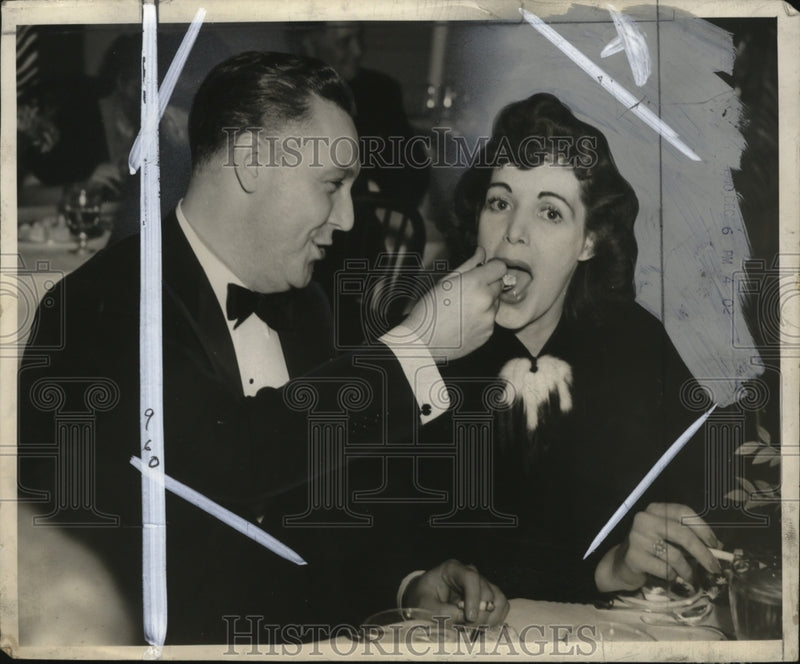 Load image into Gallery viewer, 1940 Press Photo Edward McClay dining at the University Club, caught sharing
