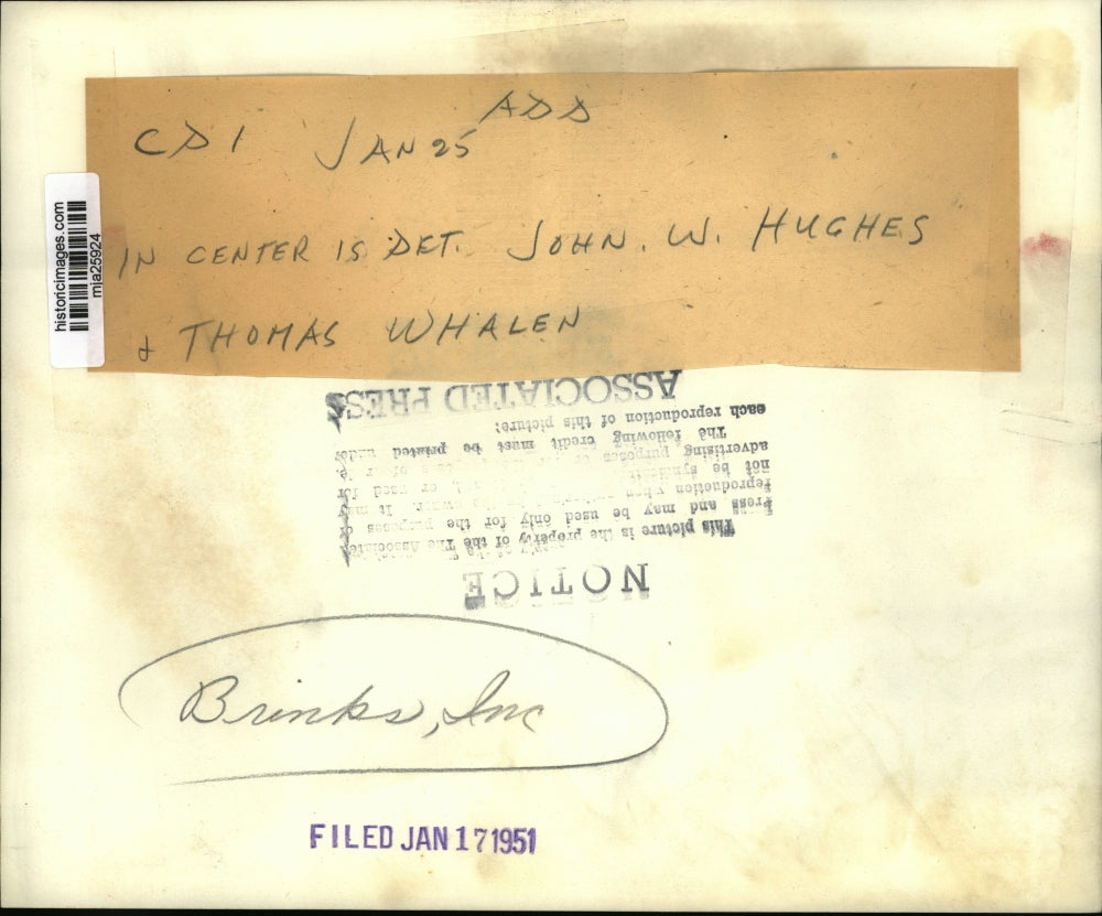 1949 Press Photo Detectives display the seven Cleveland Brink's Inc., uniforms