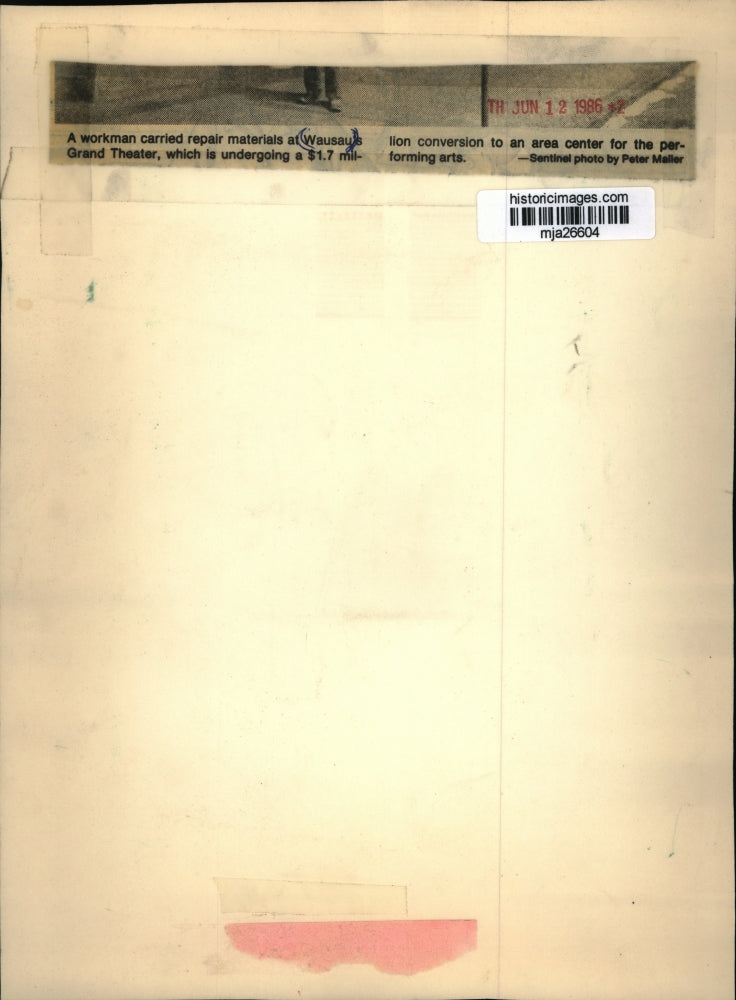 1986 Press Photo Workman with repair materials at Wausau's Grand Theater