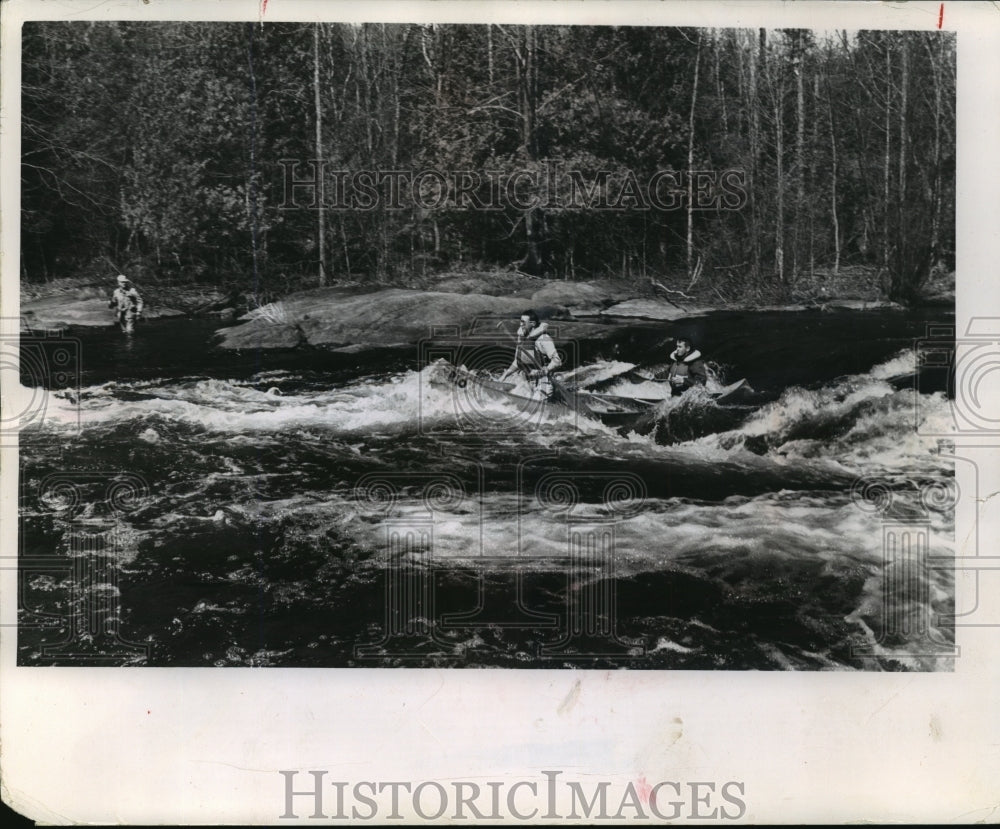 1963 Press Photo The Wolfe river tests the skills of two canoeists.- Historic Images