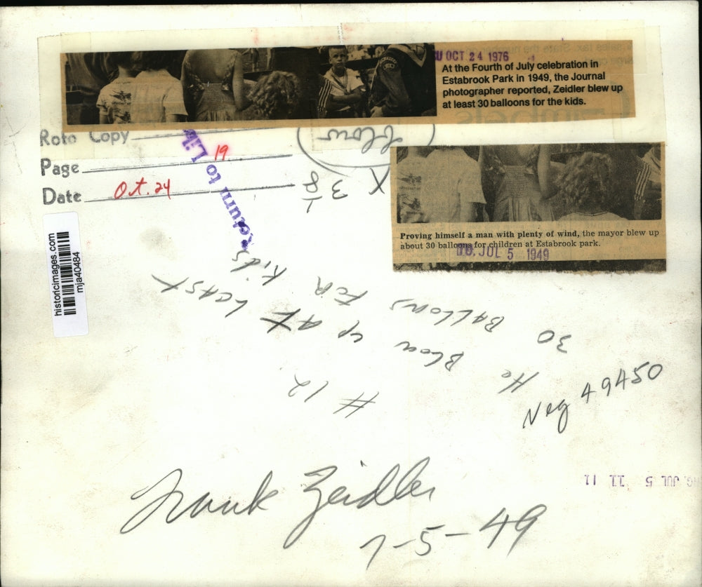 1949 Press Photo Mayor Zeidler Blew up at Least 30 Balloons at Estabrook Part