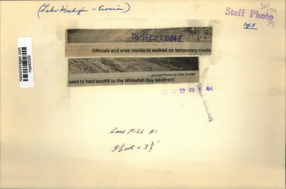 1984 Press Photo Officials and residents walk on temporary roads used for trash