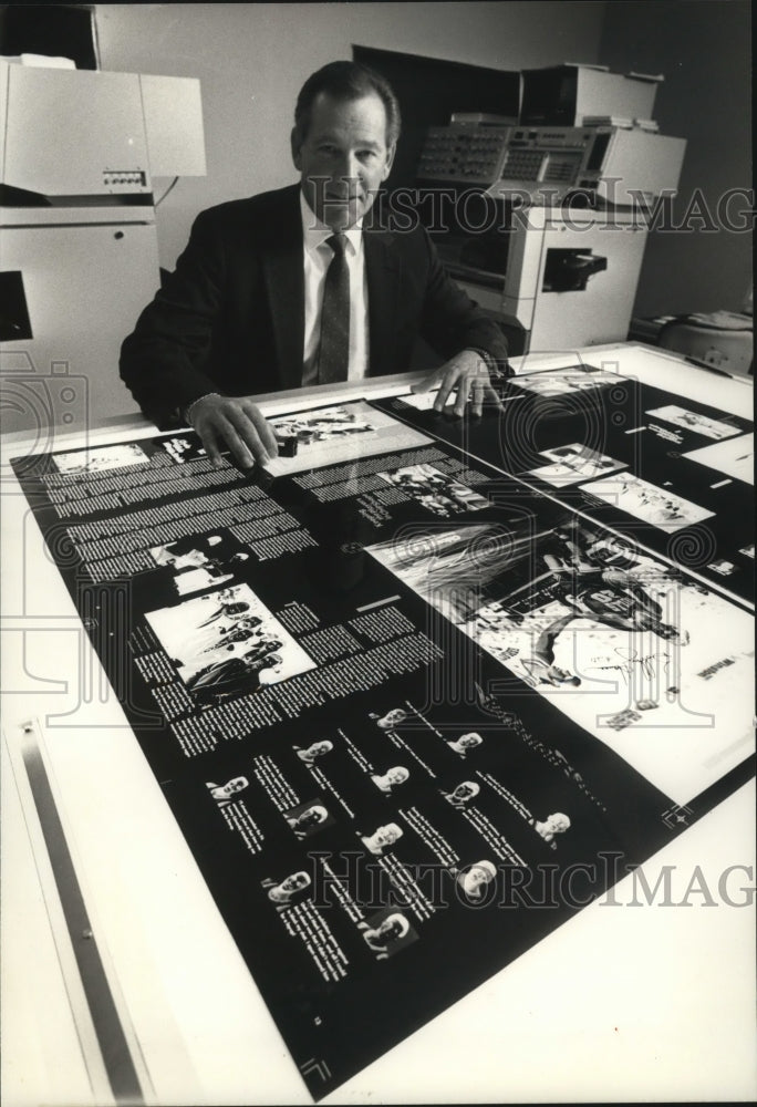 1992 Press Photo Fred Zak checks the negative of a magazine for the Chicago Buls- Historic Images