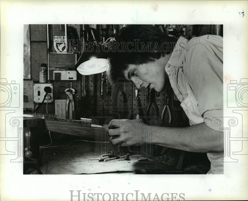 Load image into Gallery viewer, 1983 Press Photo Shayne Caywood, Gunsmith in Minocqua, Working on Rifle

