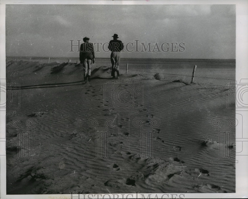 Load image into Gallery viewer, 1956 Press Photo Two farmers inspect land near Kit Carson in eastern Colorado
