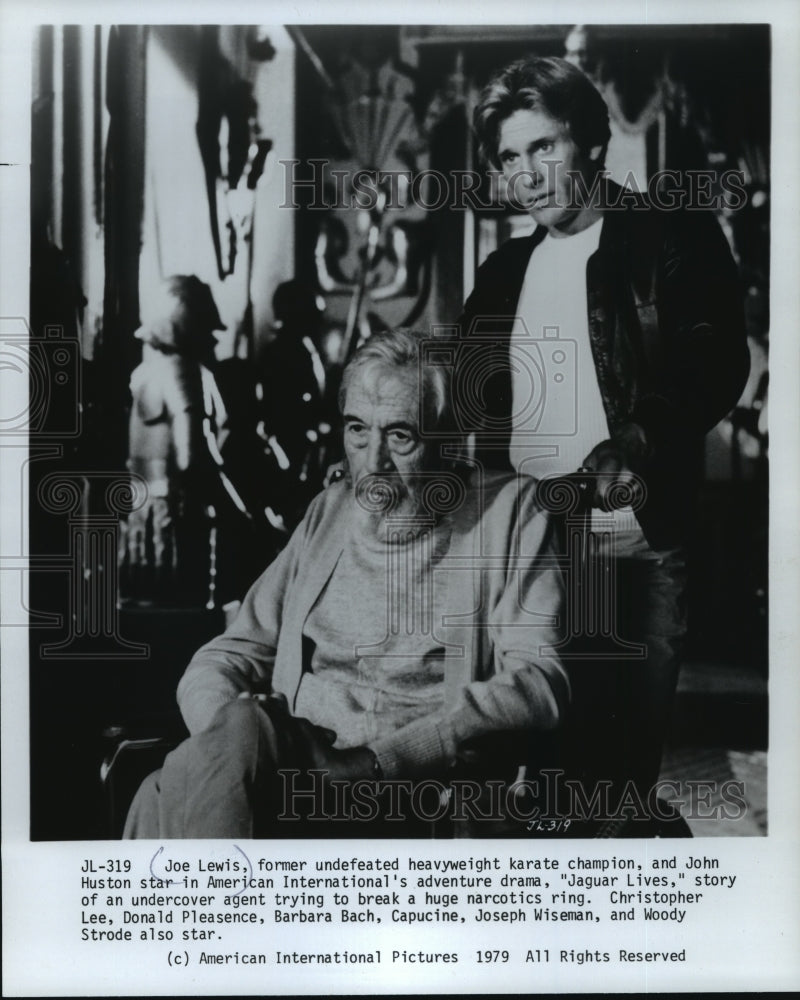 1979 Press Photo Joe Lewis &amp; John Huston star in &quot;Jaguar Lives&quot; - mja51386- Historic Images