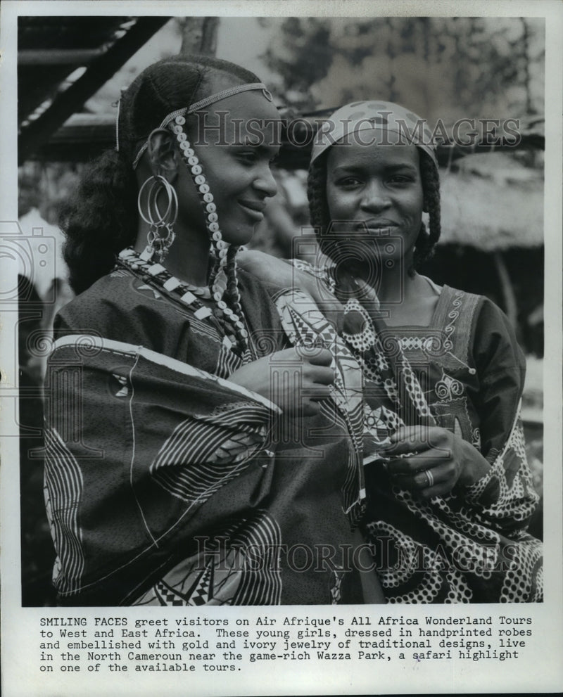Load image into Gallery viewer, 1971 Press Photo African girls in North Cameroun in traditional robes &amp; jewelry
