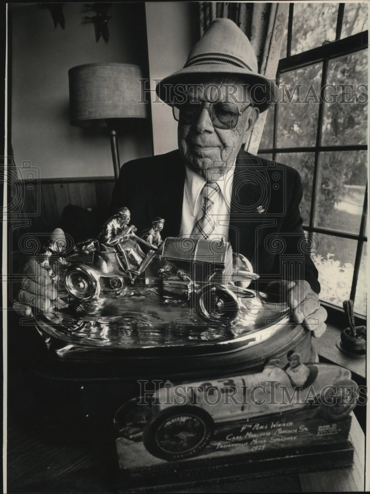 1986 Press Photo Wisconsin Auto Racer Tom Marchese with a group of trophies- Historic Images