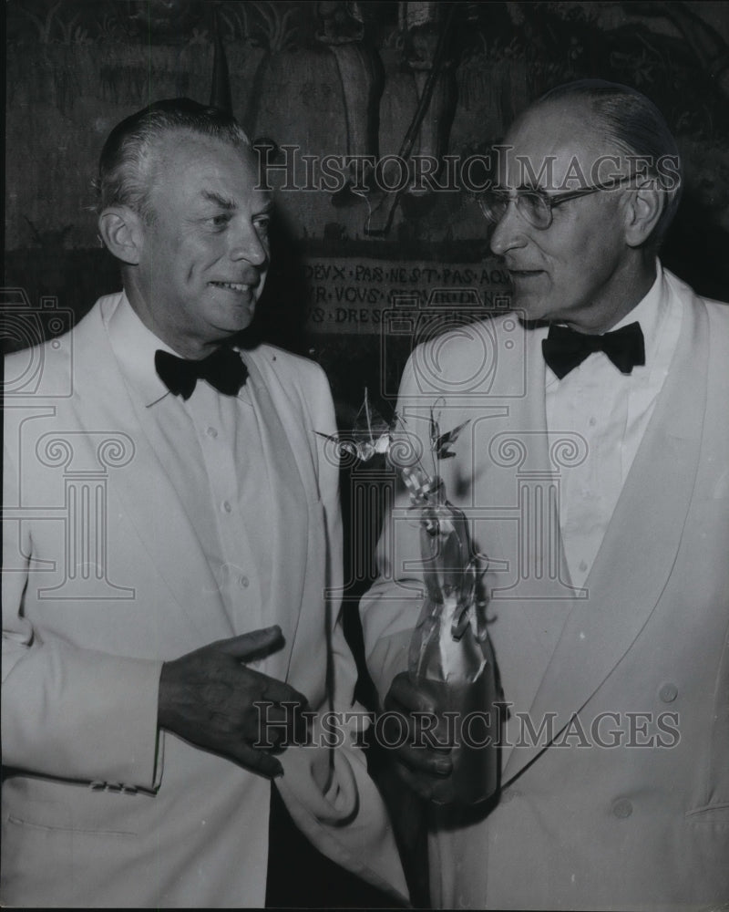 1956 Press Photo William Brumder brought a gift of champagne for his hosts
