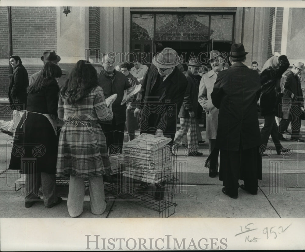 1978 Press Photo Selling Paper in Front of Saint Adrian&#39;s Catholic Church- Historic Images