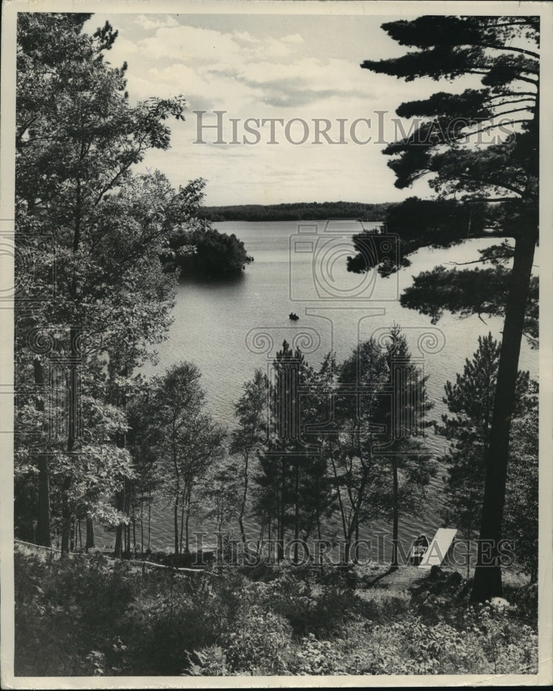 Load image into Gallery viewer, 1953 Press Photo Boat At Shoreline Dock On High Lake In Wisconsin's Vilas County
