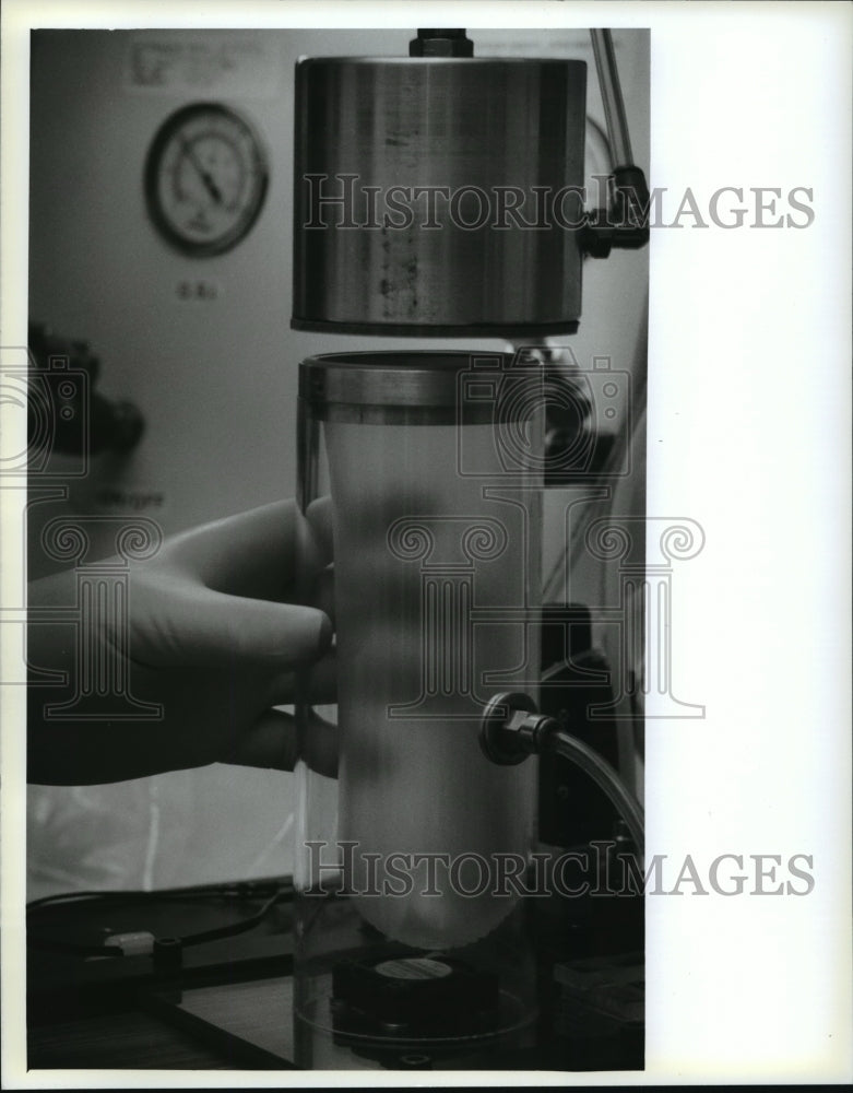 1993 Press Photo Female Condom Being Helium Tested for Leaks- Historic Images