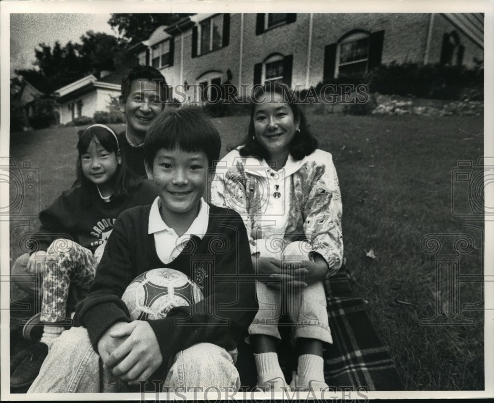 1992 Press Photo Osawa Family in Front of Their Brookfield Home, Wisconsin- Historic Images