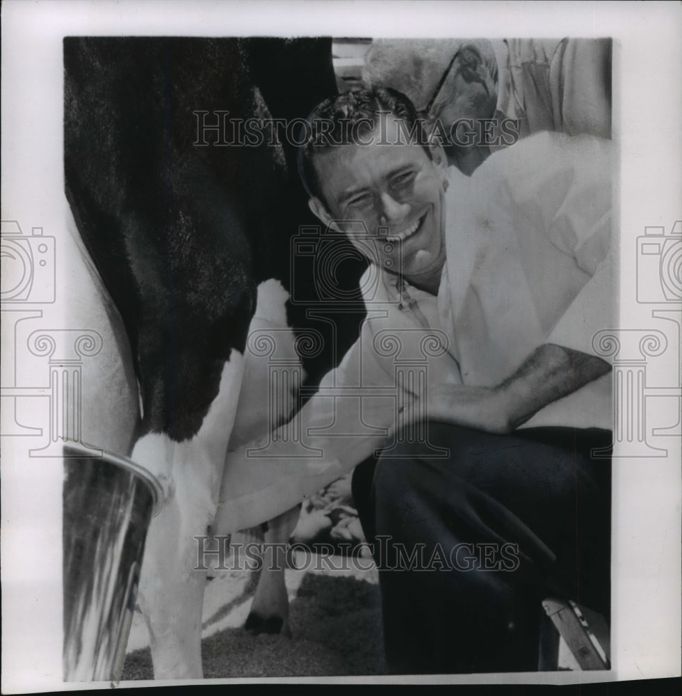 1956 Press Photo Joe Adcock milks cow in a dairy contest at Madison - mja63014- Historic Images